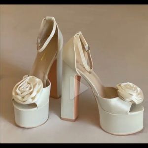 Ivory satin rosette platform heels